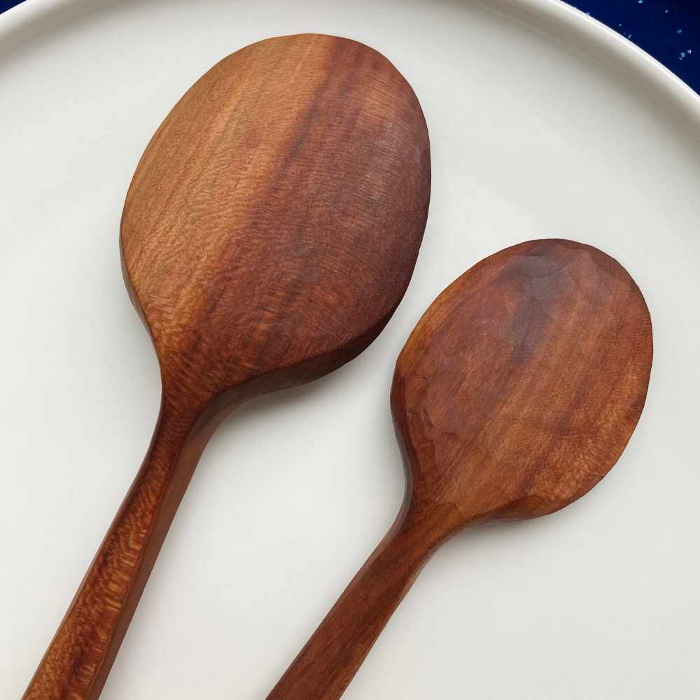 Wooden spoon hand carved of plum
