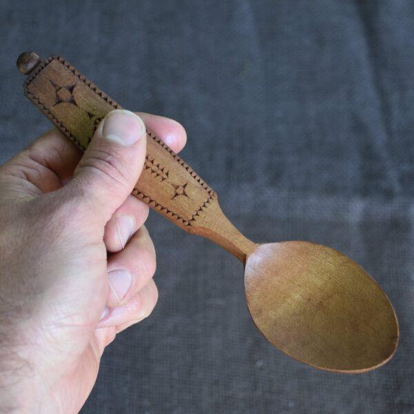 A hand carved Love Spoon with chip carved pattern. The ideal gift for newlyweds or a wooden anniversary gift!
